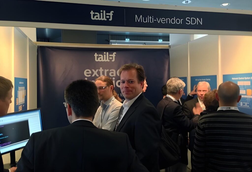 Product demo station setup with branded content and live visuals – designed by Magnus Attefall for Tail-f trade show